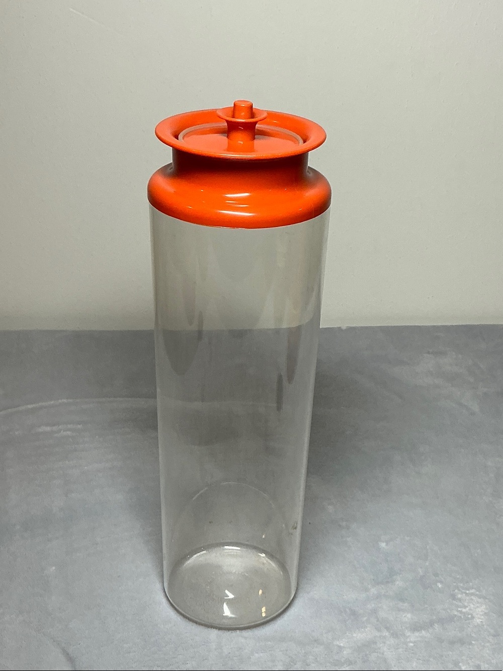 Tupperware pasta holder with Bright Orange Lid